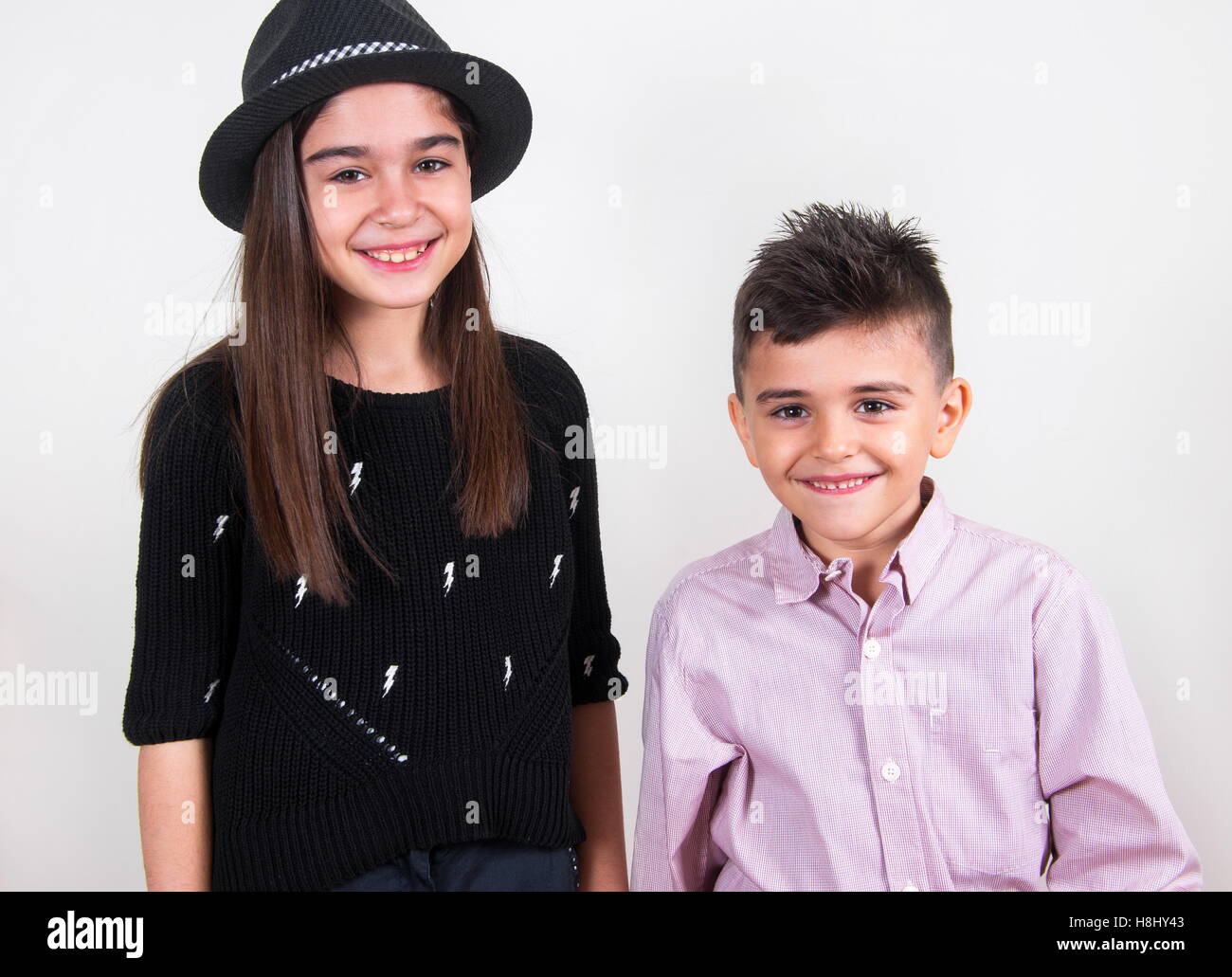 happy brother and sister having fun Stock Photo - Alamy