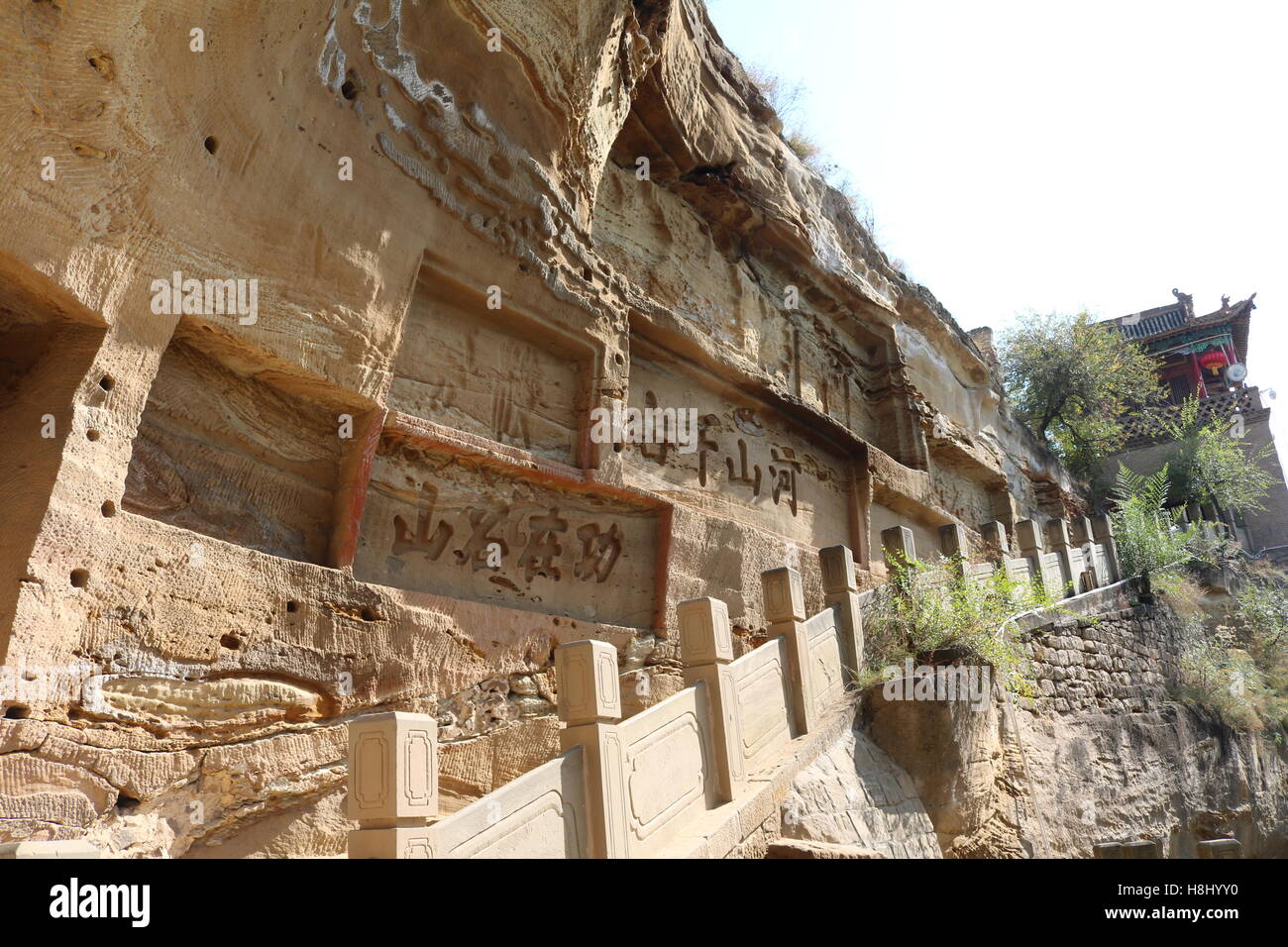 ancient Chinese carvings on wall in Guangzhou Stock Photo
