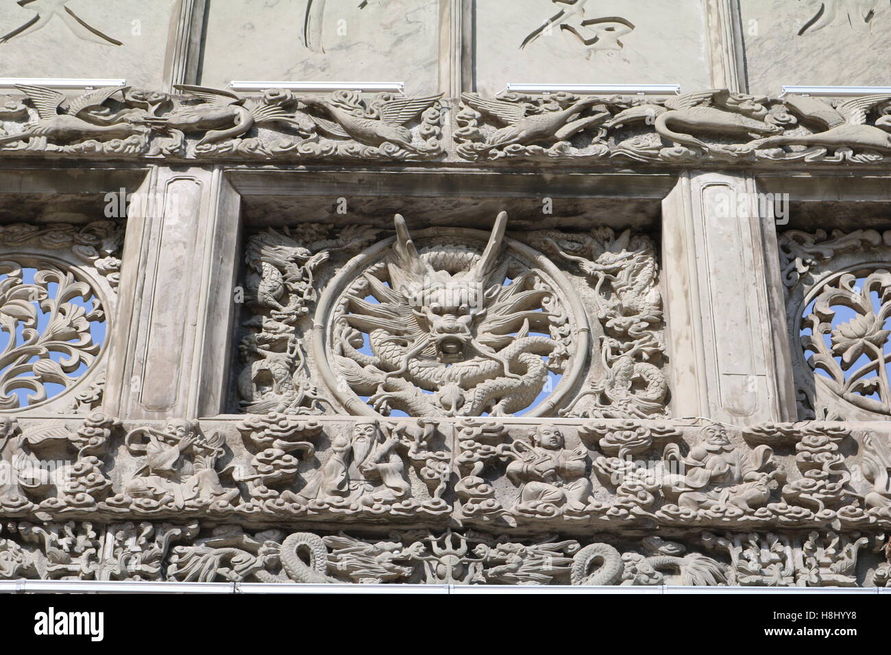 Chinese Stone intricate carving of dragon Stock Photo