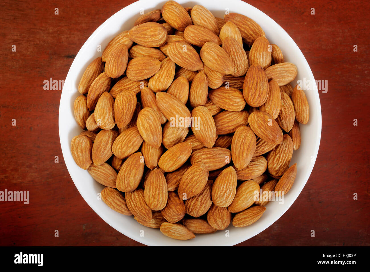 almonds in white bowl Stock Photo