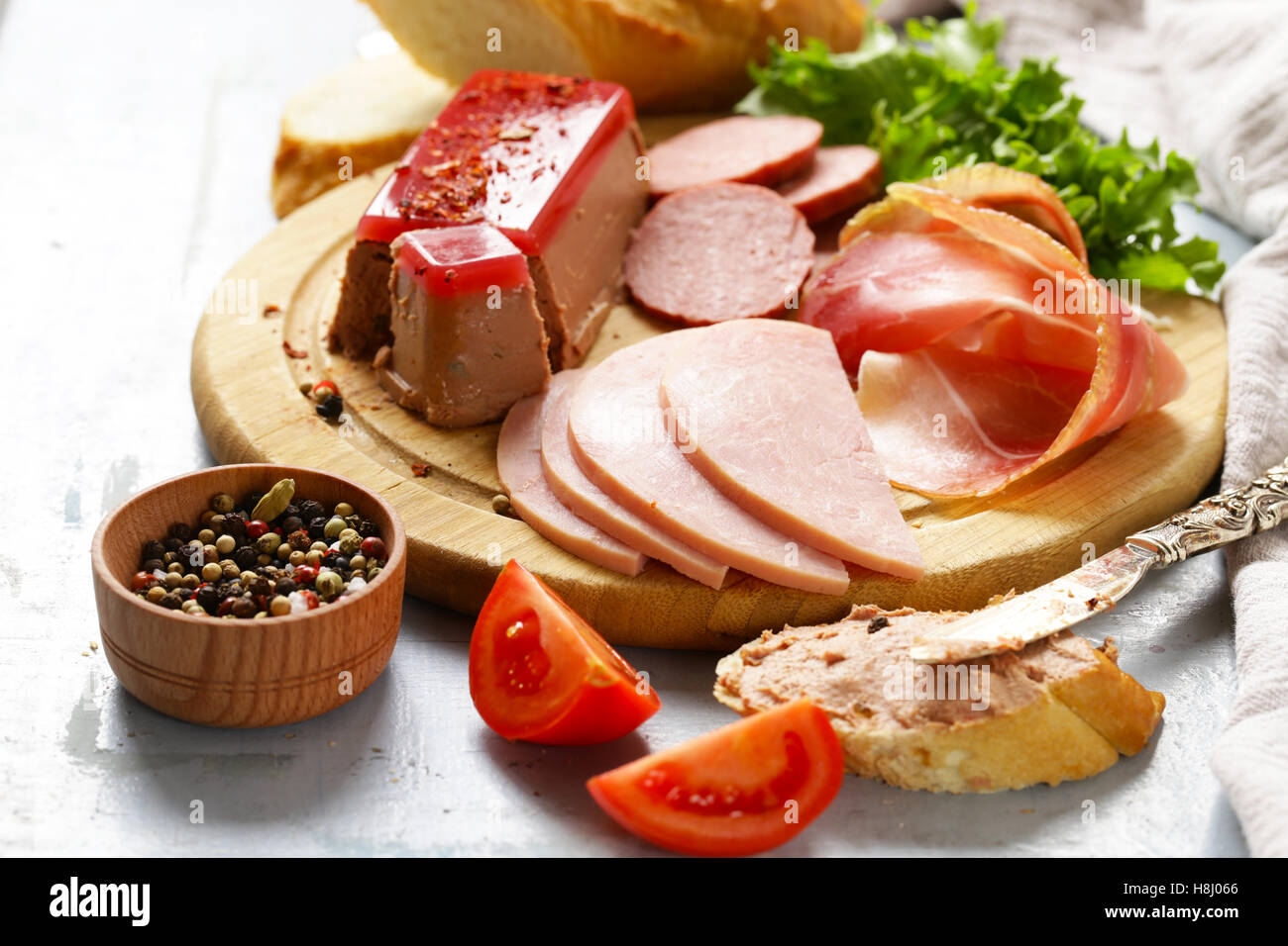 Assorted deli meats ham, salami, parma, prosciutto, pate Stock Photo