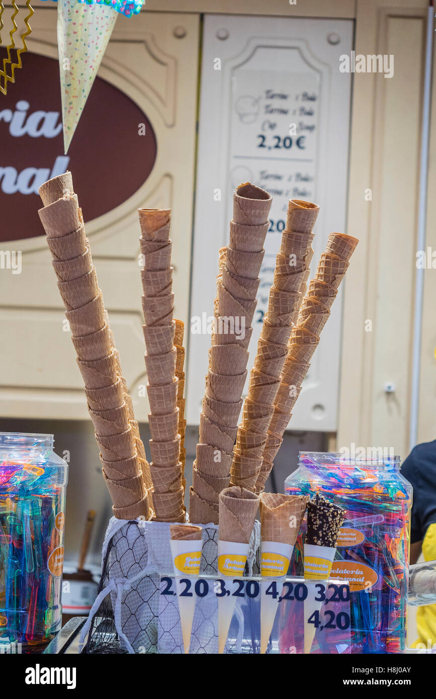 Stacks of ice cream cones on display at an ice cream shop in Barcelona