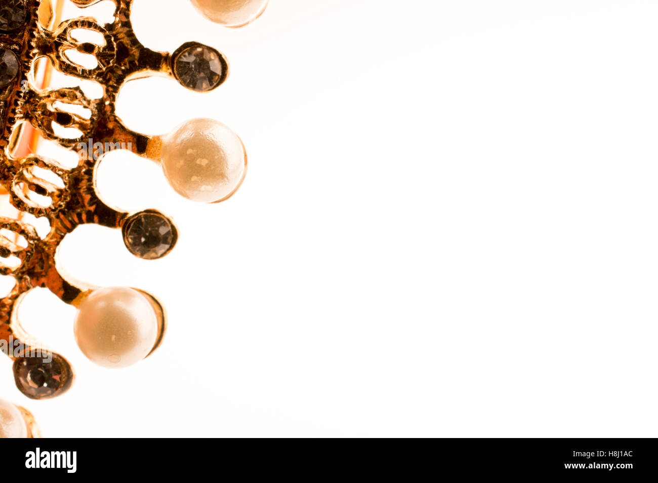 Golden color crown model with pearls on white background Stock Photo ...