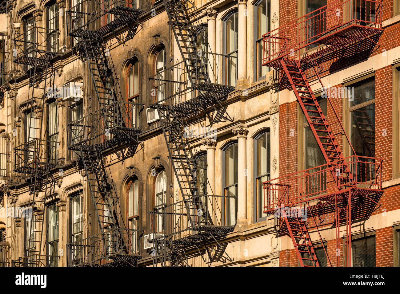 Soho building facades with fire escapes, Manhattan, New York City Stock Photo