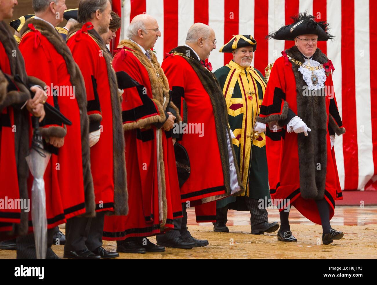 The new Lord Mayor of London Andrew Parmley (right) leaves the