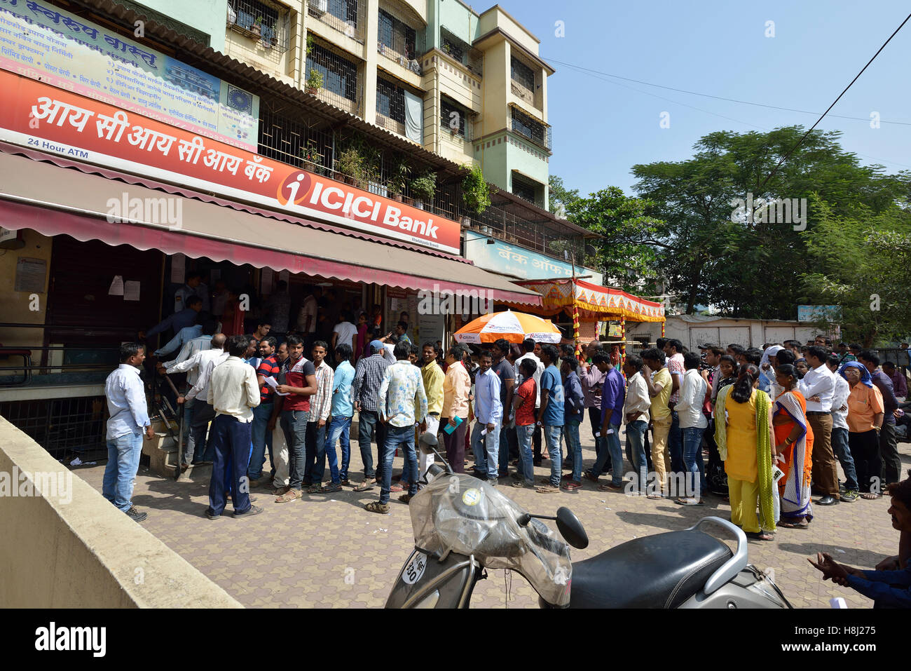 People Waiting Outside Bank To Withdraw And Deposit Old Demonetizes Indian Currency In Bombay Maharashtra ,India Stock Photo