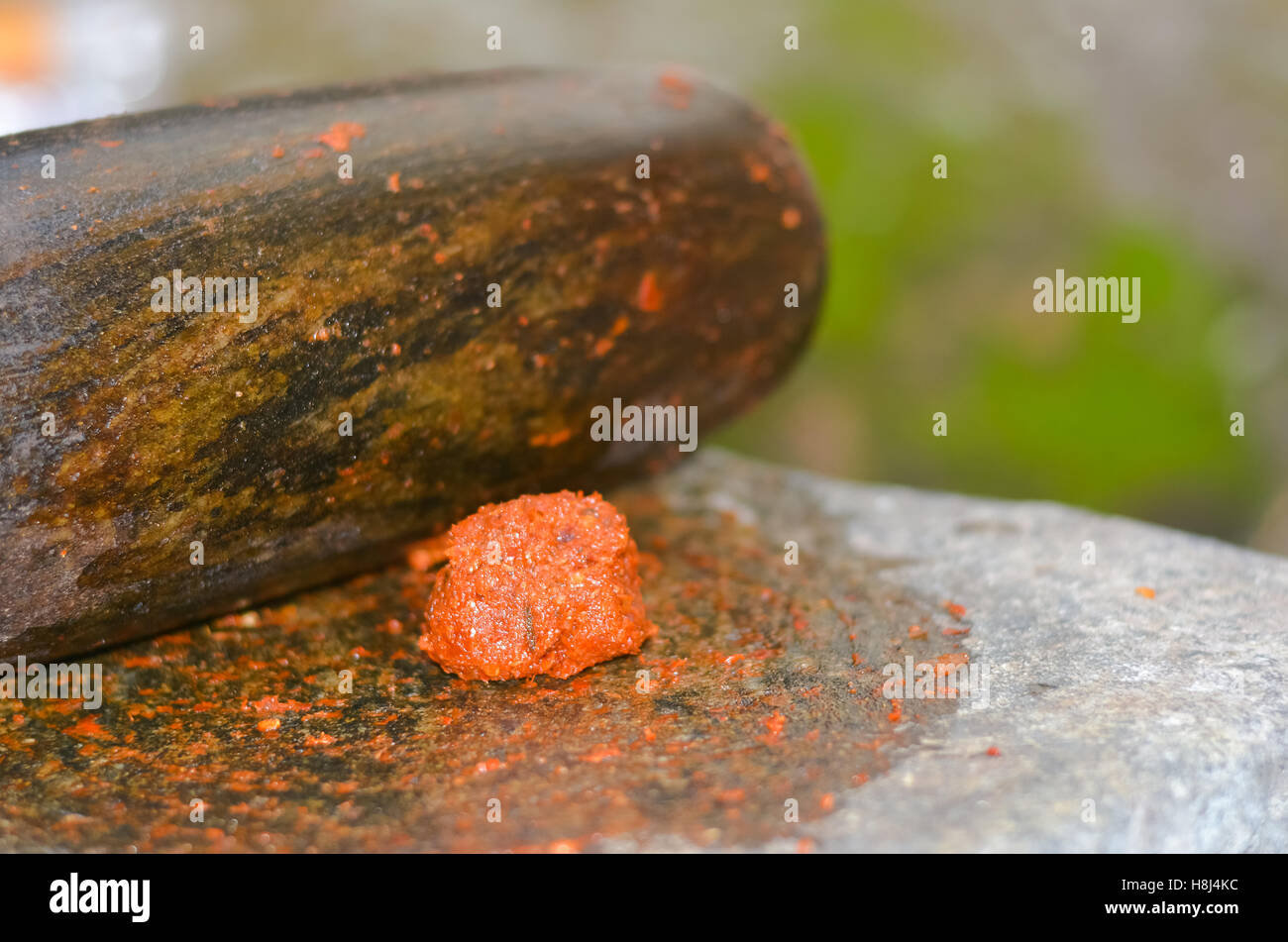 Traditional Sri Lankan way of grinding spices with the grinding stone