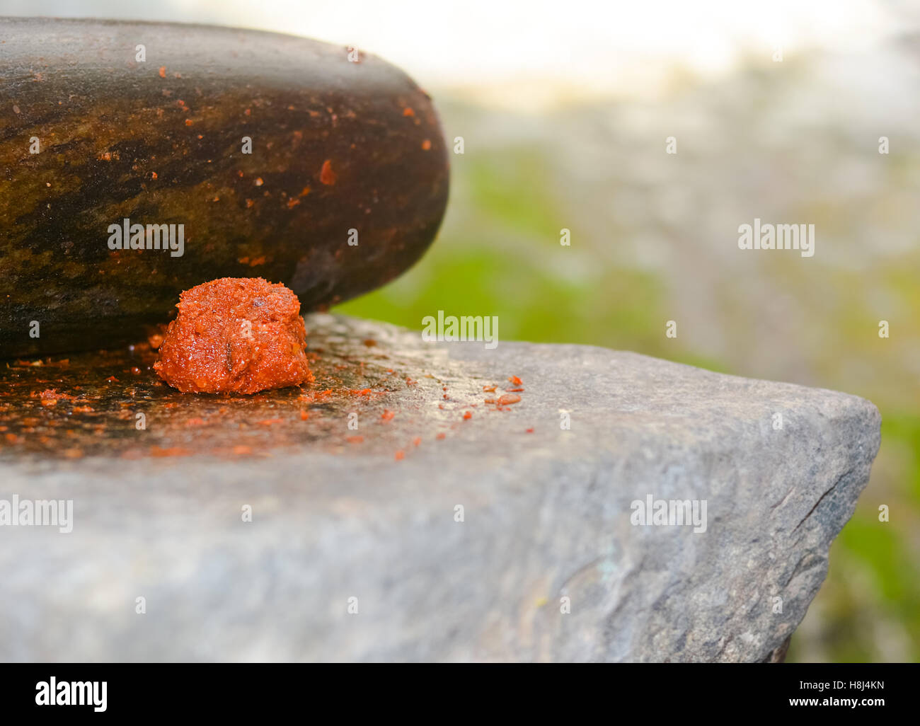 Traditional Sri Lankan way of grinding spices with the grinding stone