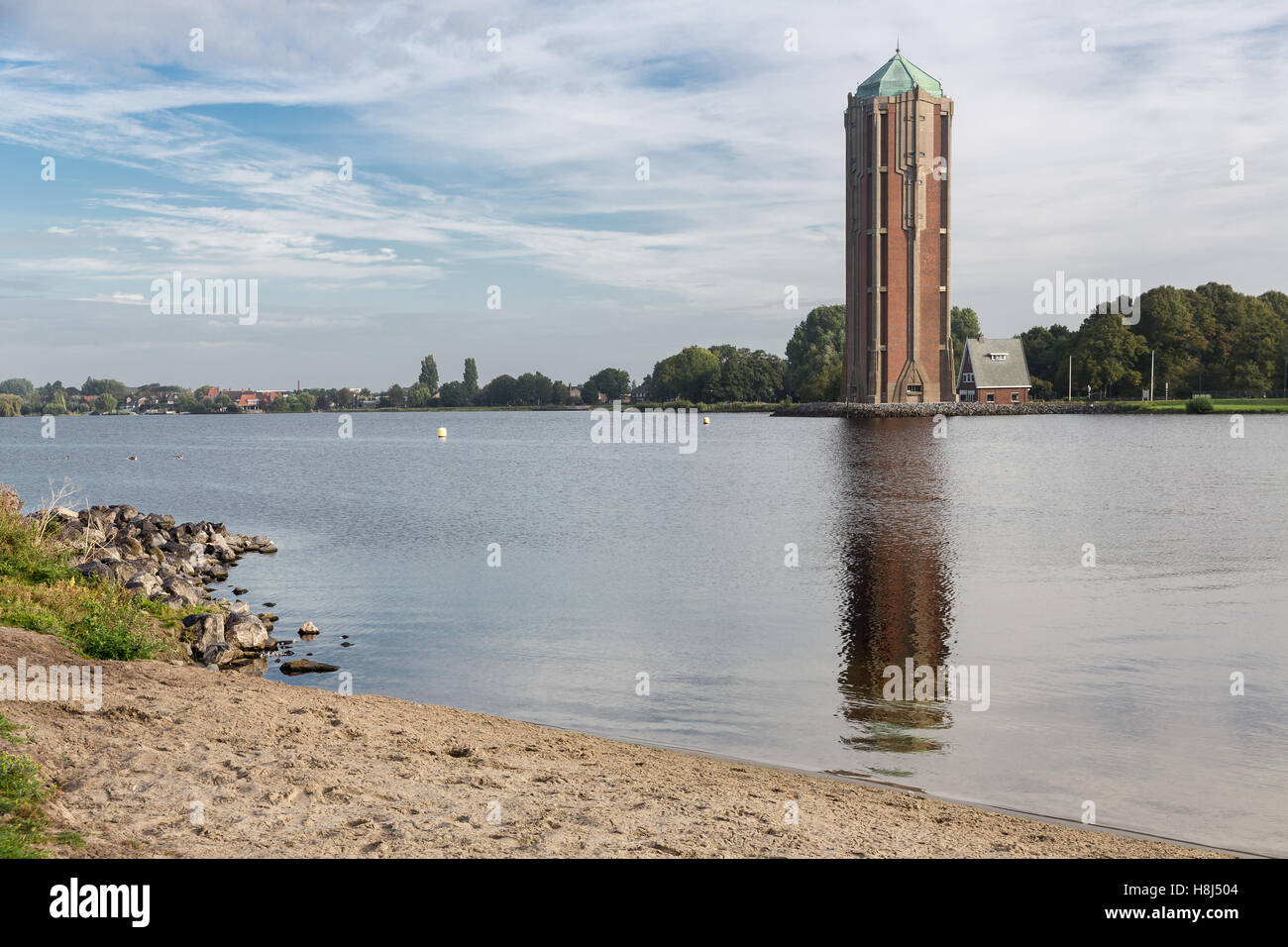 Old water tower near lake in Aalsmeer, The Netherlands Stock Photo