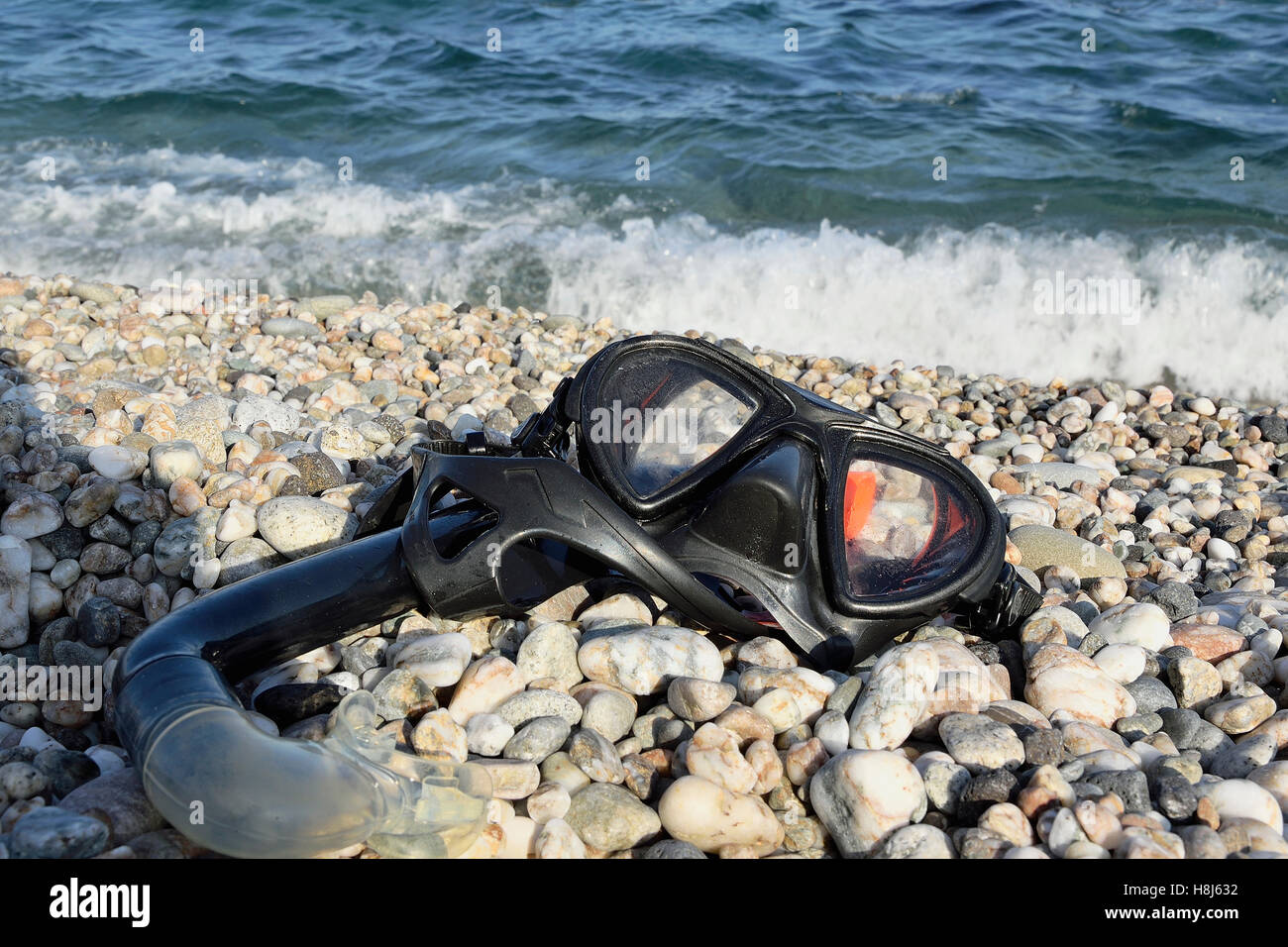 Scuba diving equipment on a seashore Stock Photo - Alamy