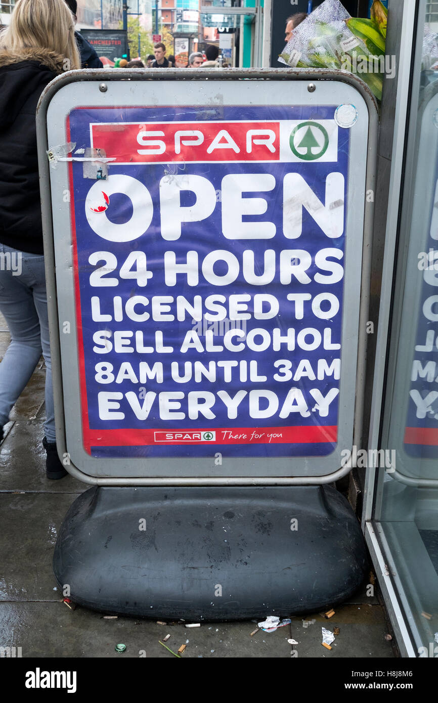 Spar 'Open All Hours' Christmas shop window display, Manchester, UK