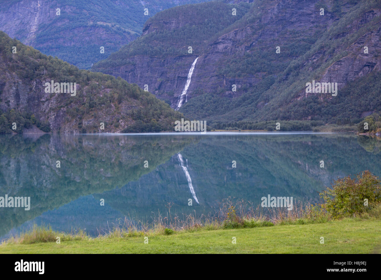 Waterfall in Eidsvatnet Lake in Fortun, Luster Municipality in Sogn og Fjordane county, Norway Stock Photo