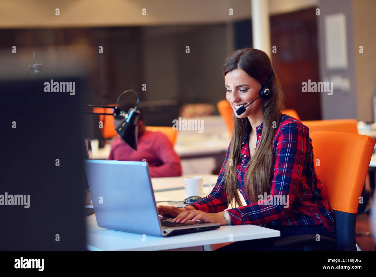 Successful business woman working at the office Stock Photo - Alamy