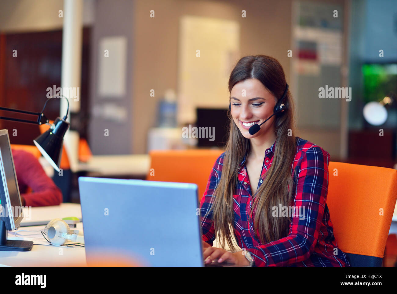 Successful business woman working at the office Stock Photo - Alamy