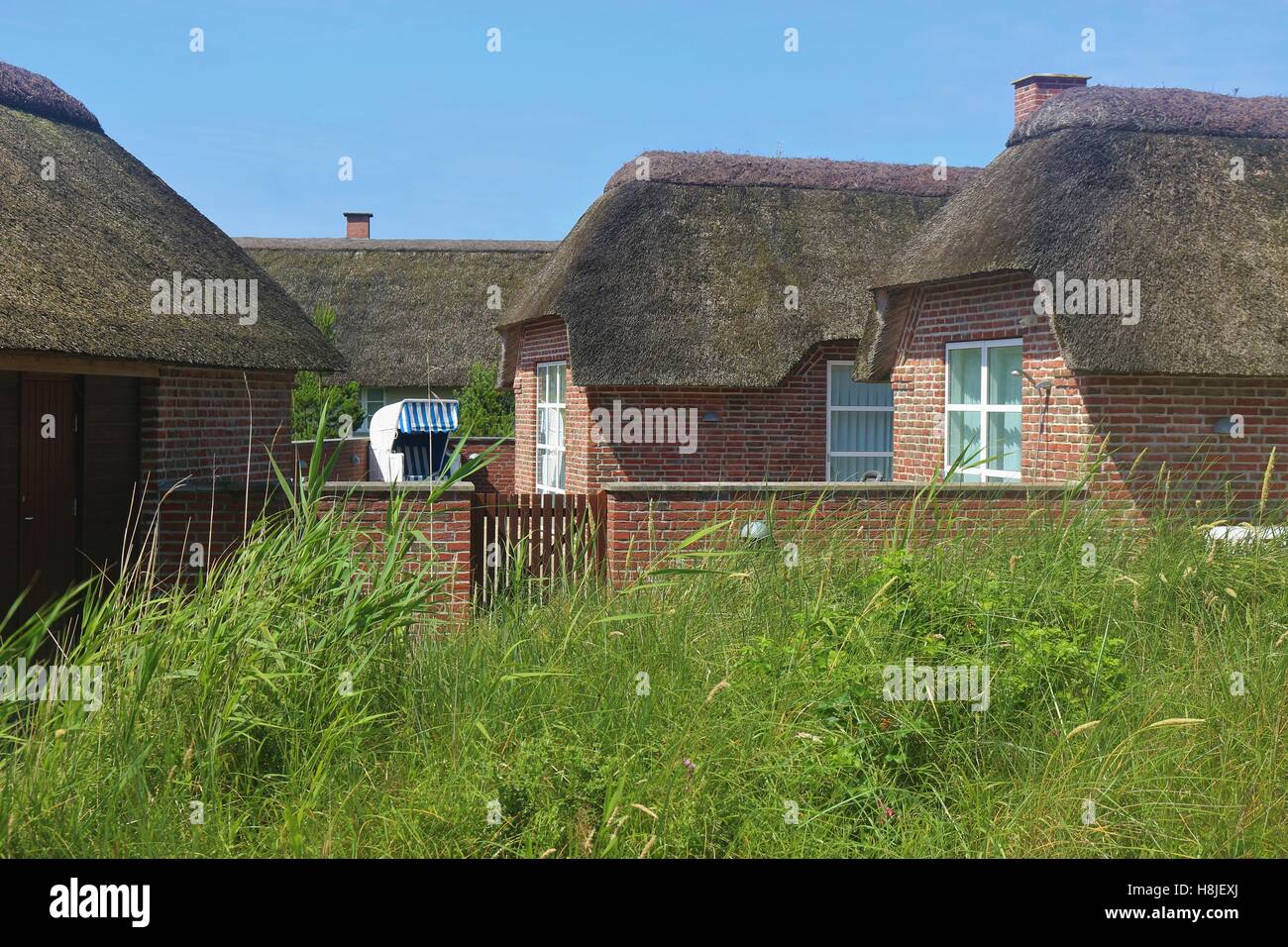 Thatched Cottages in the Holiday Location Henne Strand. On the west coast of southern Denmark, Europe. Stock Photo