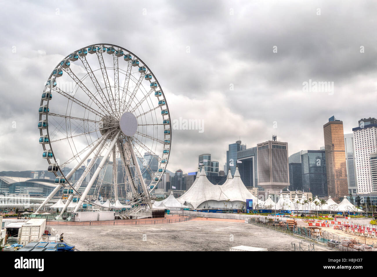 HDR rendering of Hong Kong skyline at downtown Central Pier overlooking Victoria Harbor. Stock Photo