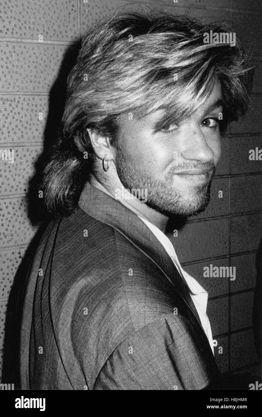 George Michael of Wham in 1986. © RTMcbride / MediaPunch ...
