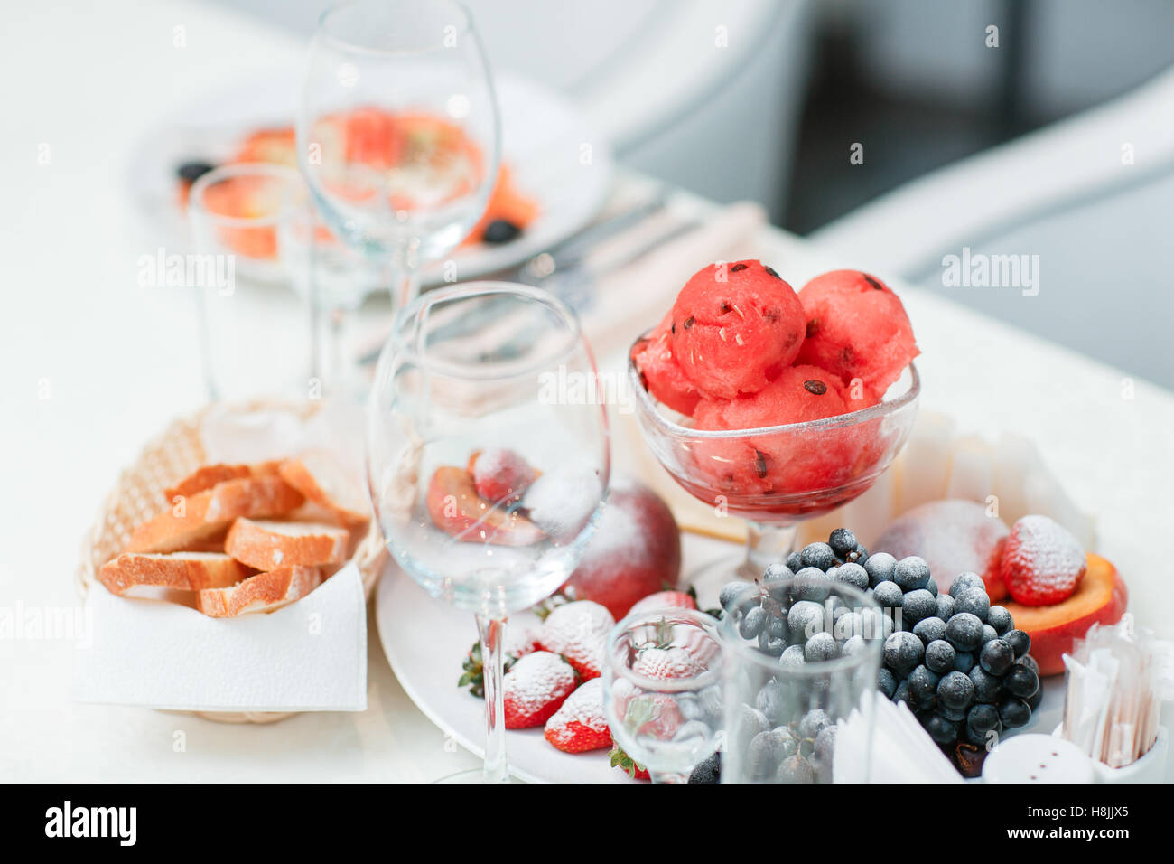 ripe sliced watermelon and melon grapes strawberries Stock Photo Alamy