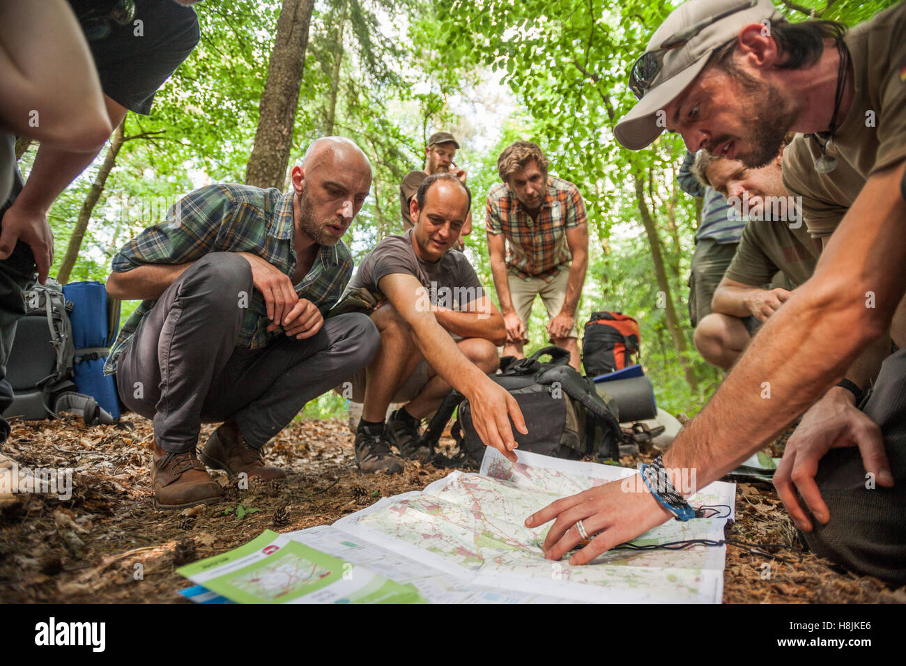 Hikers planning trip map hi-res stock photography and images - Alamy