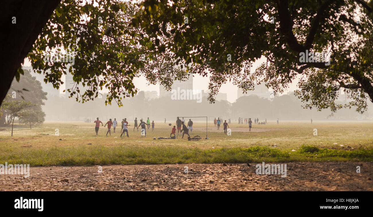 KOLKATA, INDIA 22 Oct 2016 Boys play soccer on the Maidan on October 22, 2016 in Kolkata