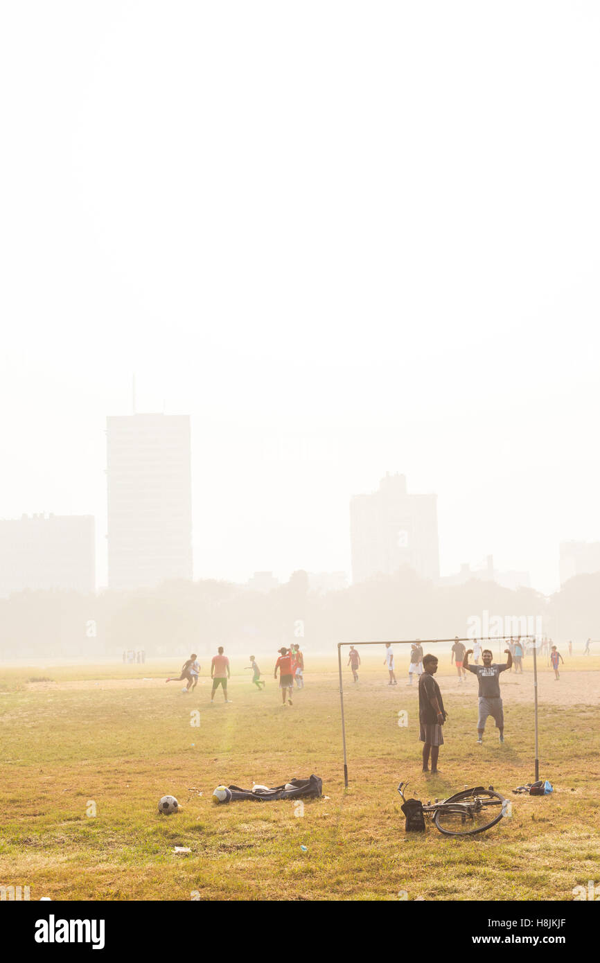 KOLKATA, INDIA 22 Oct 2016 Boys play soccer on the Maidan on October 22, 2016 in Kolkata