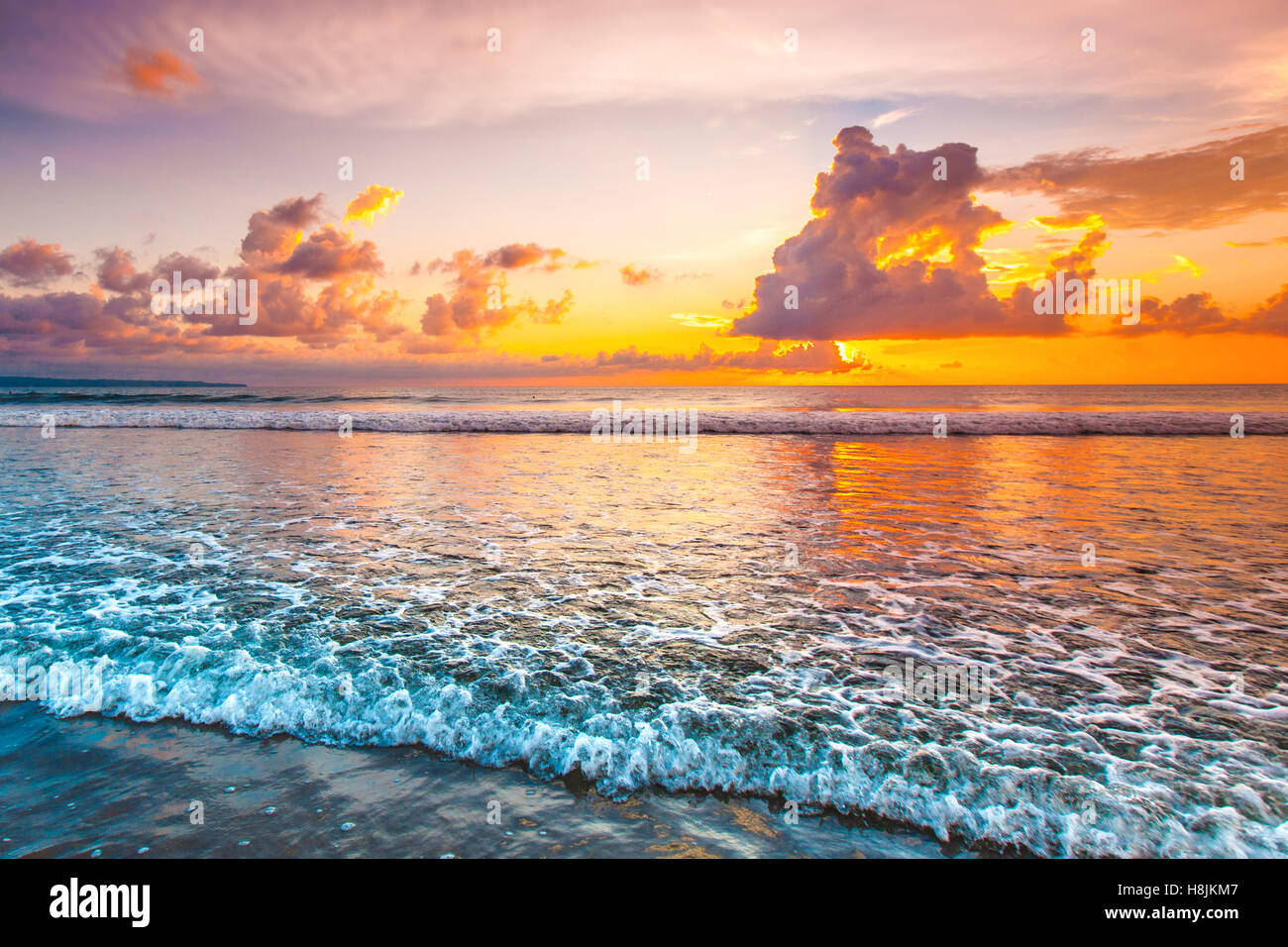 Sunset over sea on Bali, Seminyak, Double six beach Stock Photo - Alamy