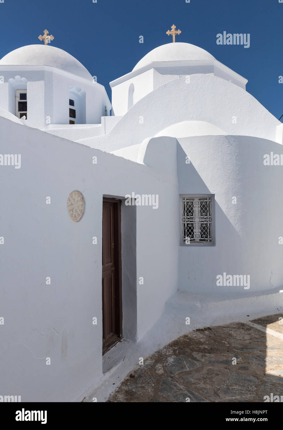 Twin church domes in the whitewashed village of Chora (Hora) on Amorgos, one of the Cyclades islands of Greece Stock Photo