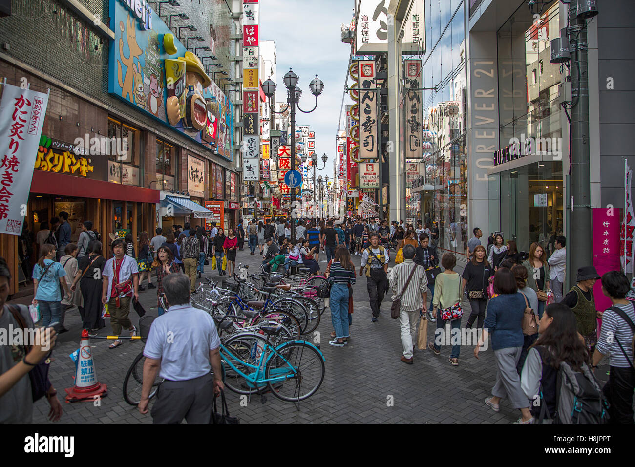 OSAKA, JAPAN . OCTOBER 9, 2016: Unidentified people on the street of Osaka, Japan. Osakai is known for its modern architecture, Stock Photo