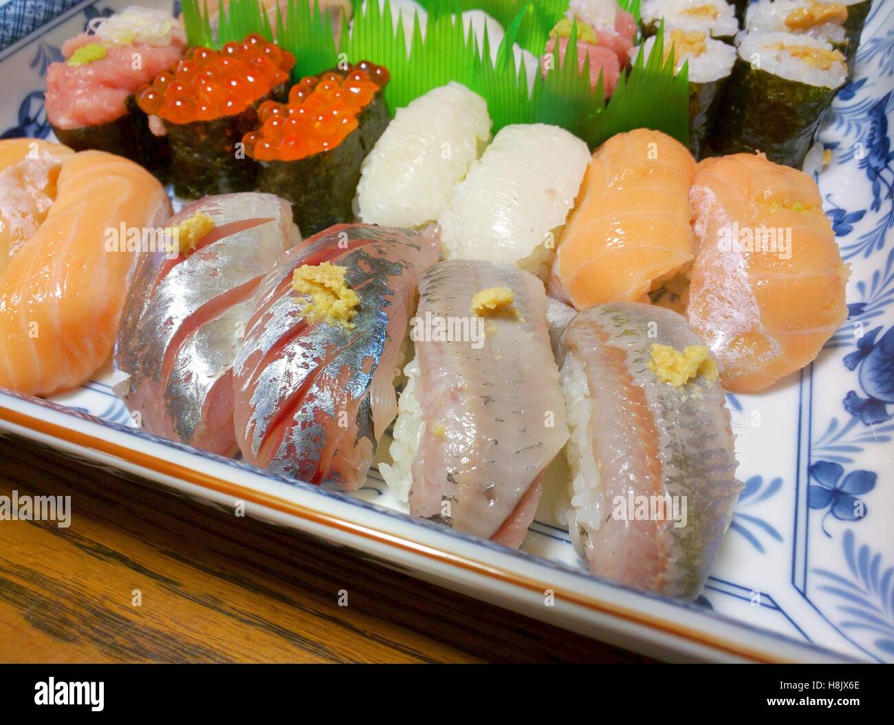 Sushi assortment closeup on a plate, several types Stock Photo