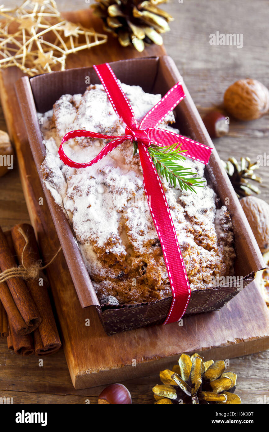 Traditional fruitcake for Christmas with decoration and ornaments - homemade Christmas pasrty Stock Photo