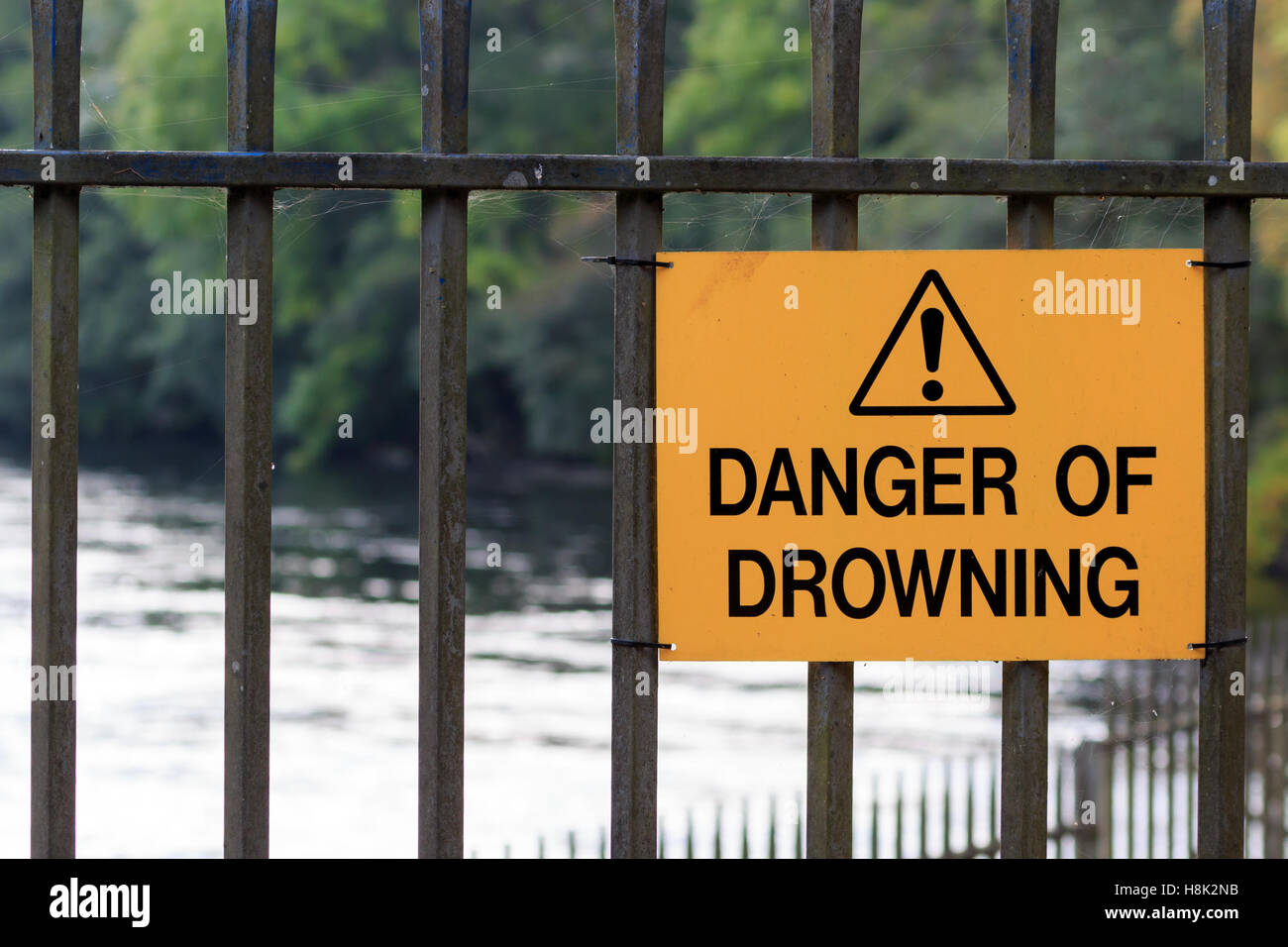 Yellow and black Danger of Drowning warning  sign Stock Photo