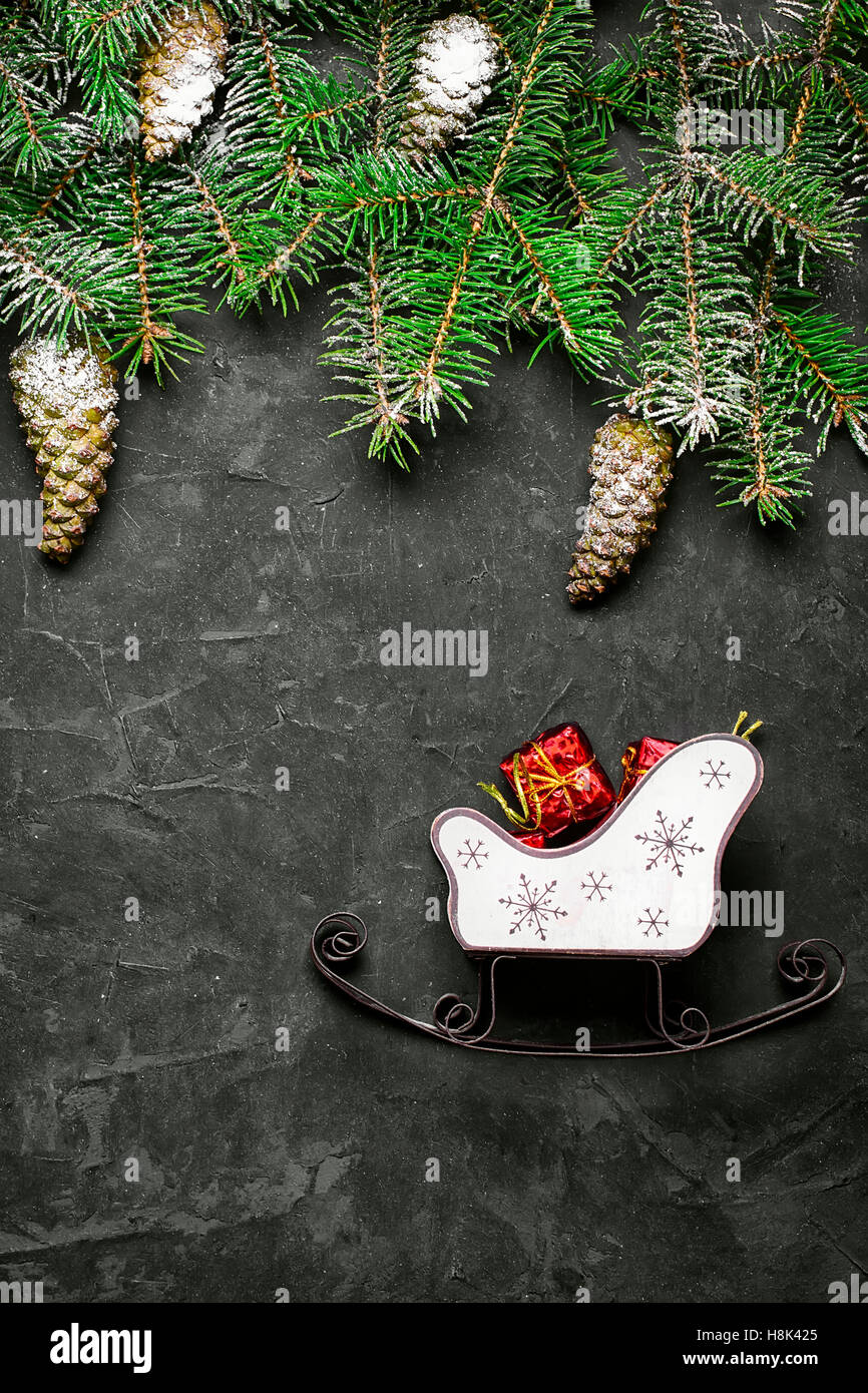 Spruce branches with pinecones and Christmas ornaments Stock Photo - Alamy
