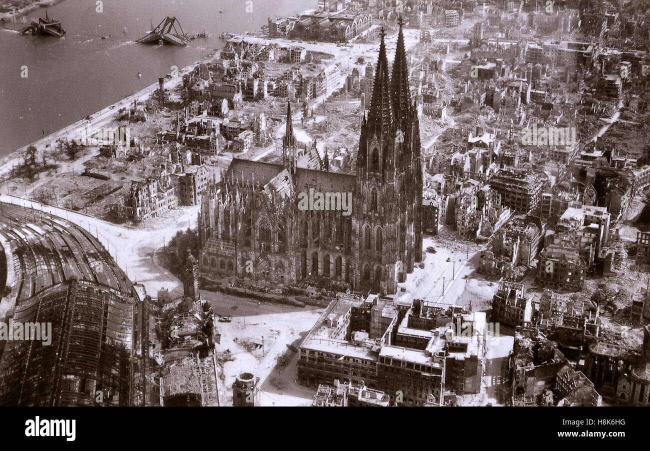 WW2 Cologne Cathedral left still standing with precision RAF bomb aiming, amidst wide spread destruction caused by World War 2 allied 'reprisal' bombing air raids on 9th March 1945  Two months later with Hitler dead Nazi Germany wisely and unconditionally surrendered 8th May 1945 Stock Photo