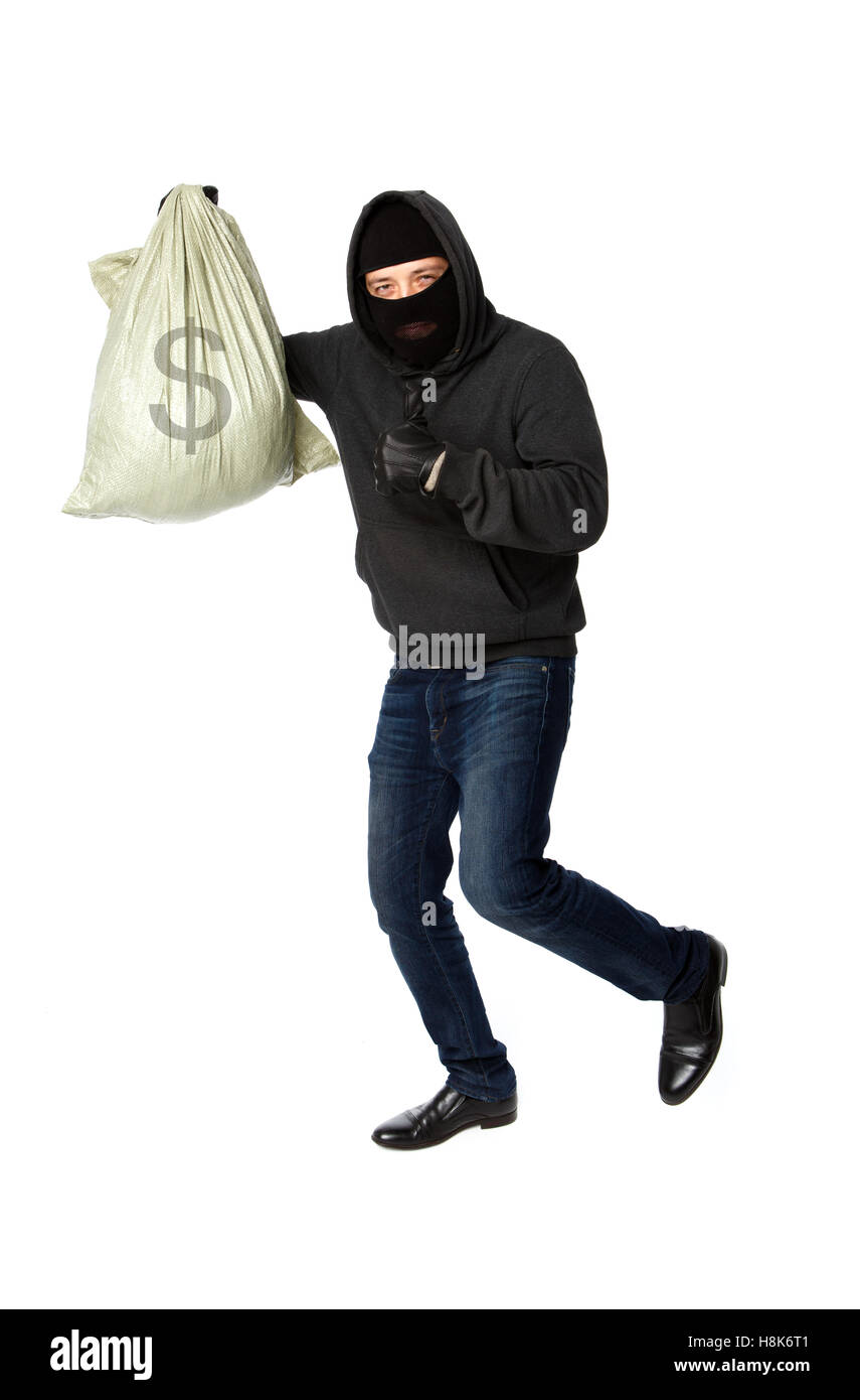 Thief with bag of money Stock Photo