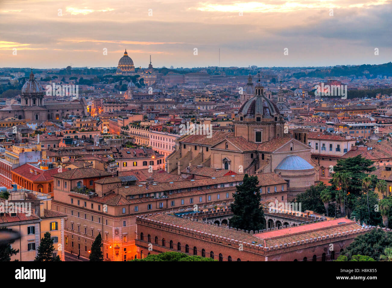 Wonderful view of Rome skyline at sunset time with St Peter Cathedral Stock Photo