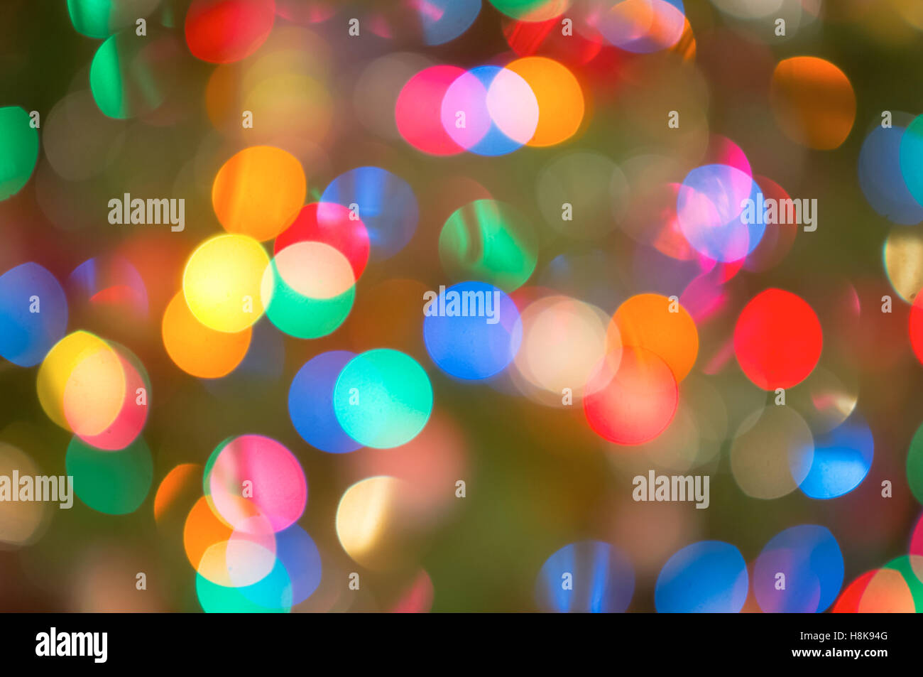 A background of colourful Christmas lights, thrown out of focus Stock