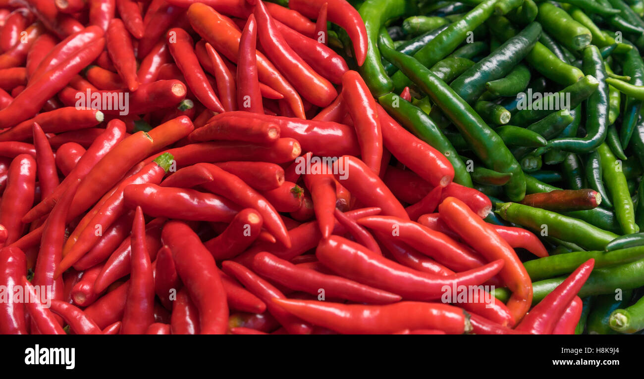 fresh red and green chili pepper background Stock Photo