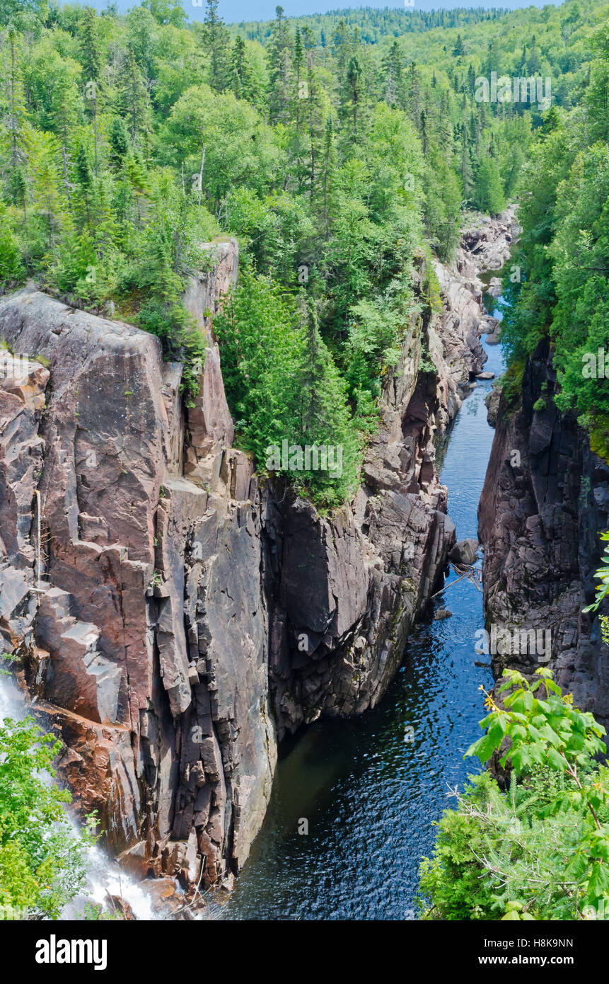 Cascading water over rocks in Black Beaver Falls in Agawa Canyon Stock Photo