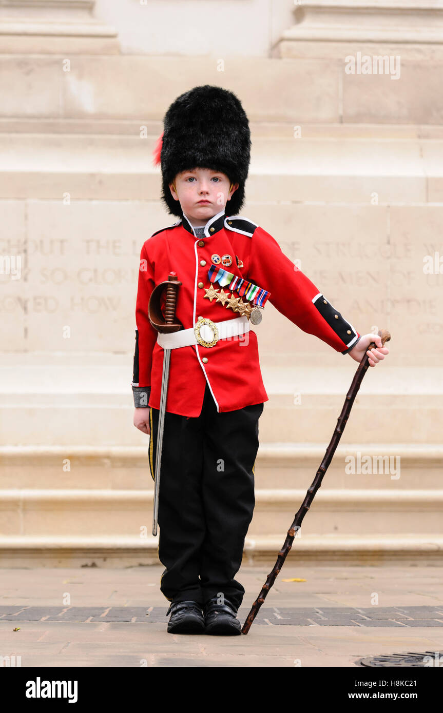 Belfast, Northern, Ireland. 13th Nov, 2016. A young boy (5) dressed as an Irish Guard, stands at the Cenotaph in Belfast prior to the Remembrance Sunday service. Credit:  Stephen Barnes/Alamy Live News Stock Photo