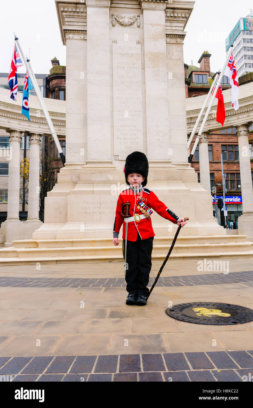 Belfast, Northern, Ireland. 13th Nov, 2016. A young boy (5) dressed as an Irish Guard, stands at the Cenotaph in Belfast prior to the Remembrance Sunday service. Credit:  Stephen Barnes/Alamy Live News Stock Photo