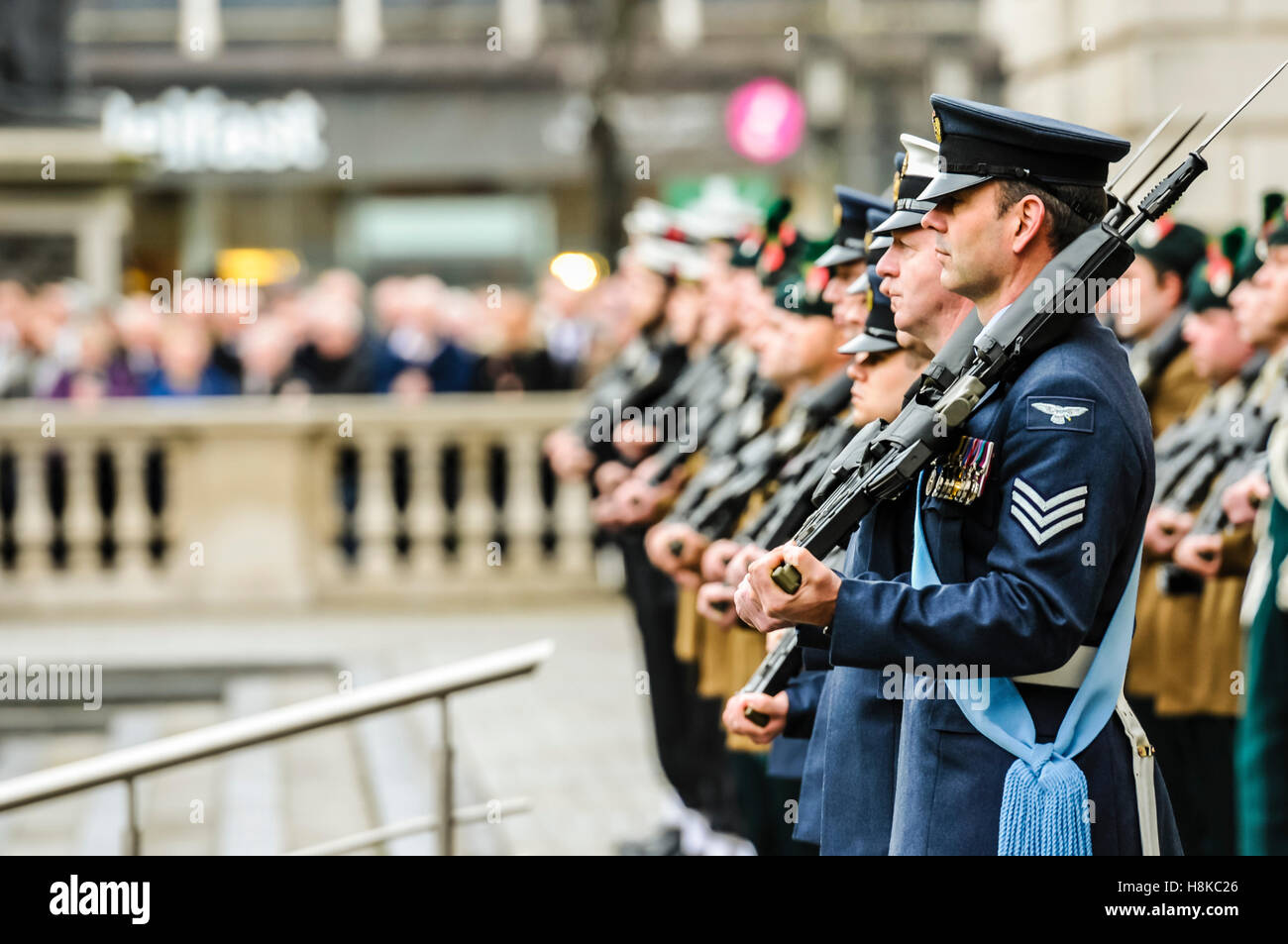 Belfast, Northern, Ireland. 13th Nov, 2016. Soldiers from the Royal Irish Regiment shoulder their weapons at the Remembrance Sunday service at Belfast City Hall Cenotaph. Credit:  Stephen Barnes/Alamy Live News Stock Photo