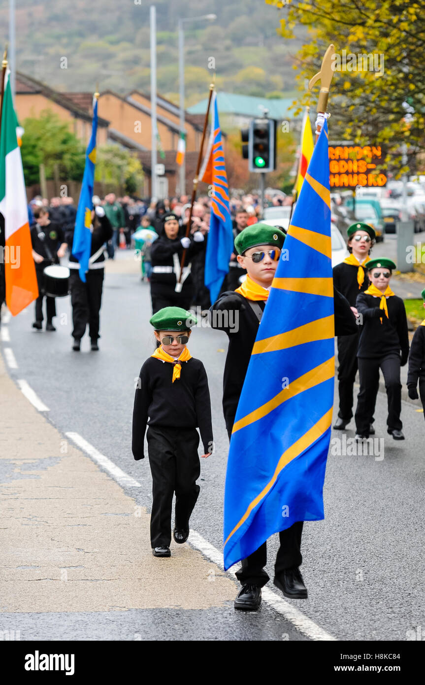 Belfast, Northern, Ireland. 13th Nov, 2016. A young boy wearing a green beret, and mirrored sunglasses, carries a flag at the head of a Republican parade in remembrance of Vol. Patricia Black, who died 15 Nov 1991. Credit:  Stephen Barnes/Alamy Live News Stock Photo