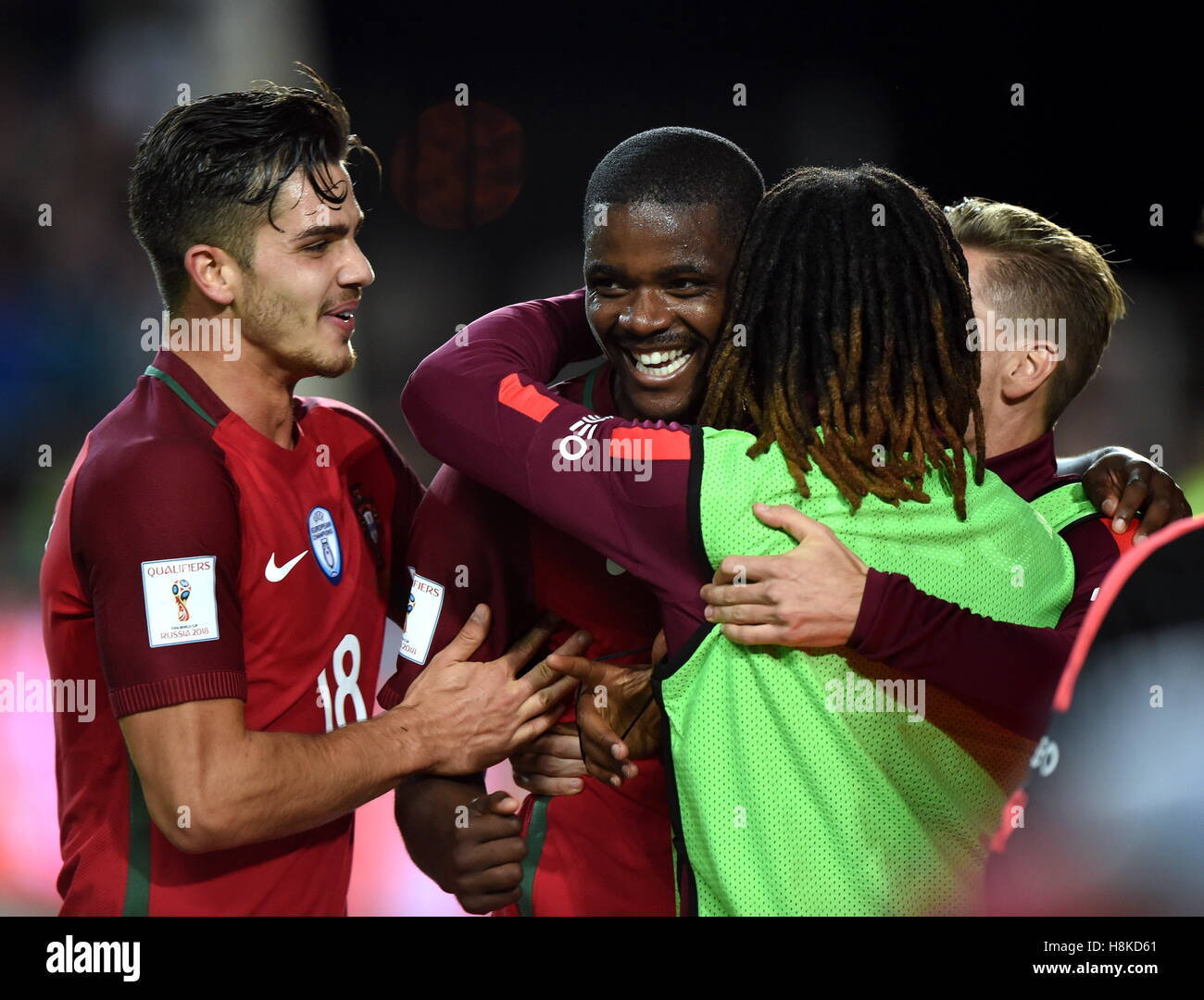 Faro, Portugal. 13th Nov, 2016. Portugal's William Carvalho (2nd L) celebrates after scoring during the FIFA World Cup 2018 qualifier Group B match between Portugal and Latvia at the Algarve stadium in Faro, Portugal, on Nov. 13, 2016. Portugal won 4-1. Credit:  Zhang Liyun/Xinhua/Alamy Live News Stock Photo