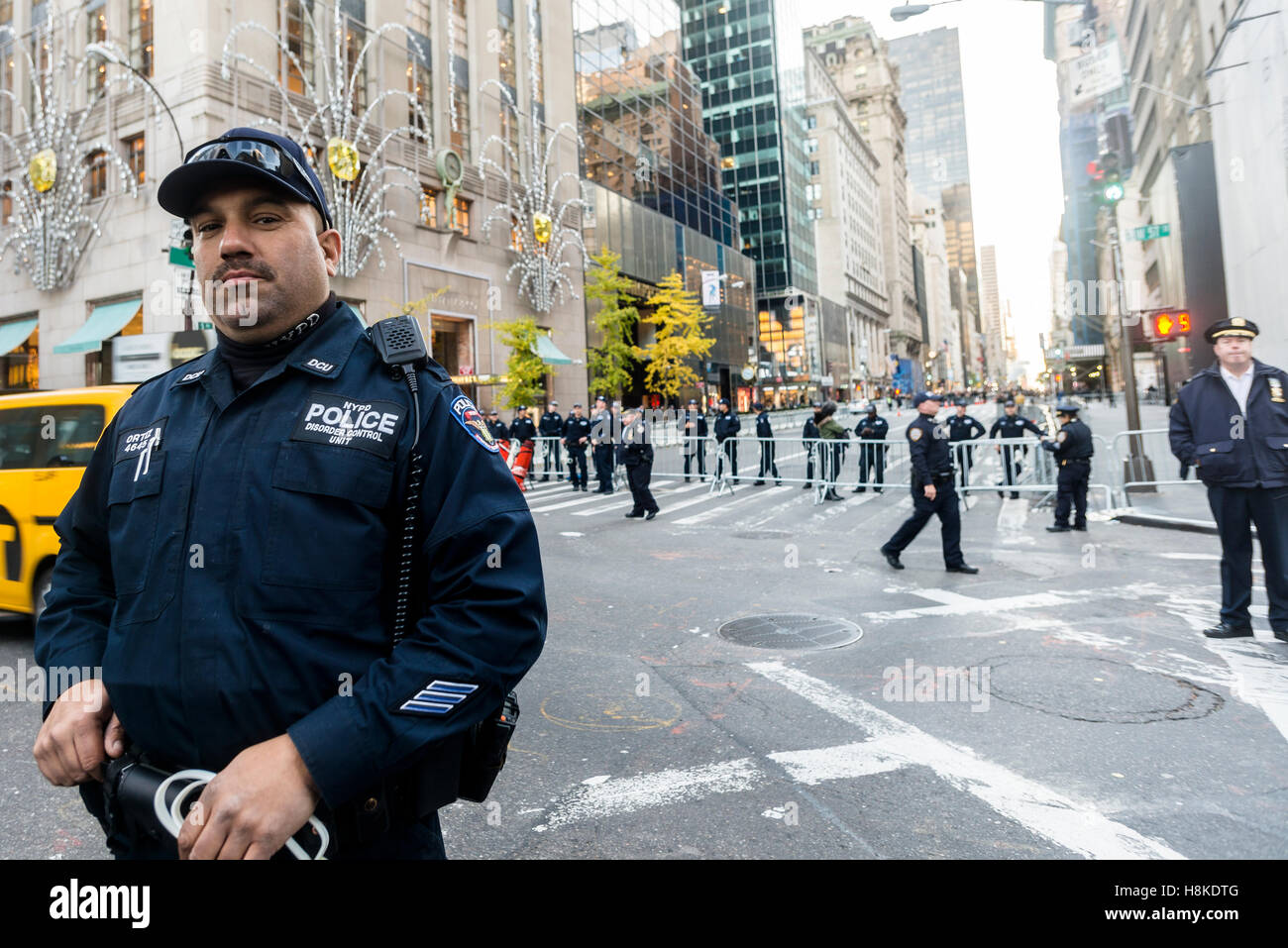 New York, USA 12 November 2016 - Taxpayer dollars spent on security for the president elect who doesn't pay taxes. NYPD shuts down part of Fifth Avenue , near Trump Tower, in the heart of Midtown Manhattan, for a fifth day after the Presidential Election  Credit:  Stacy Walsh Rosenstock / Alamy Live News Stock Photo