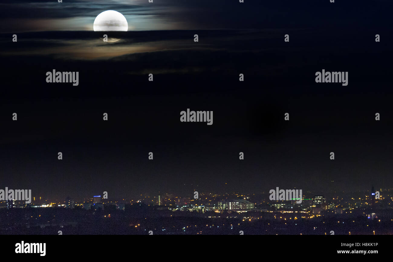 The socalled 'supermoon' appears over the city lights of Birmingham