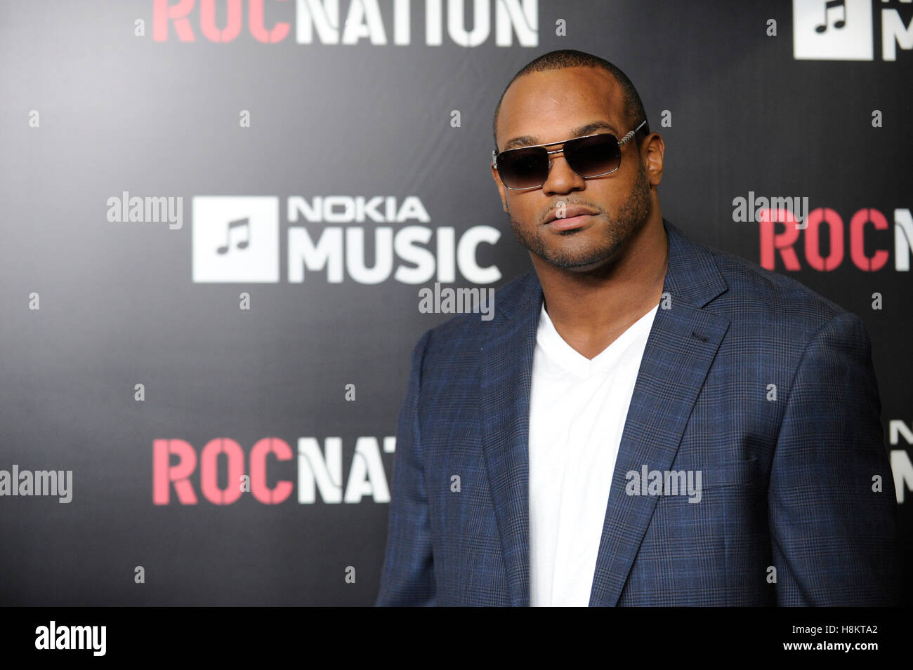 Dwight Freeney arrives at Roc Nation Pre-GRAMMY brunch at Soho House on February 9, 2013 in West Hollywood, California. Stock Photo