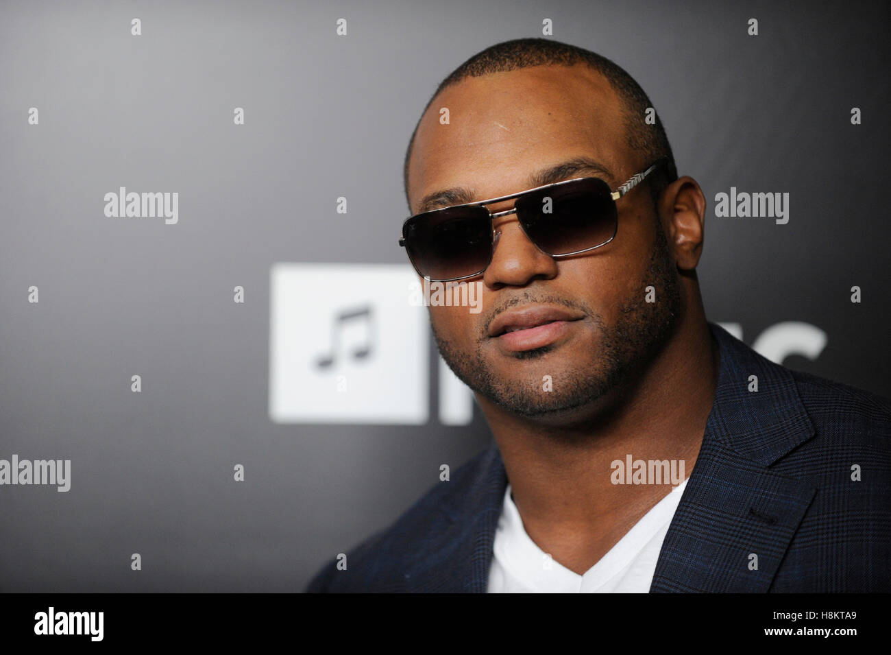 Dwight Freeney arrives at Roc Nation Pre-GRAMMY brunch at Soho House on February 9, 2013 in West Hollywood, California. Stock Photo