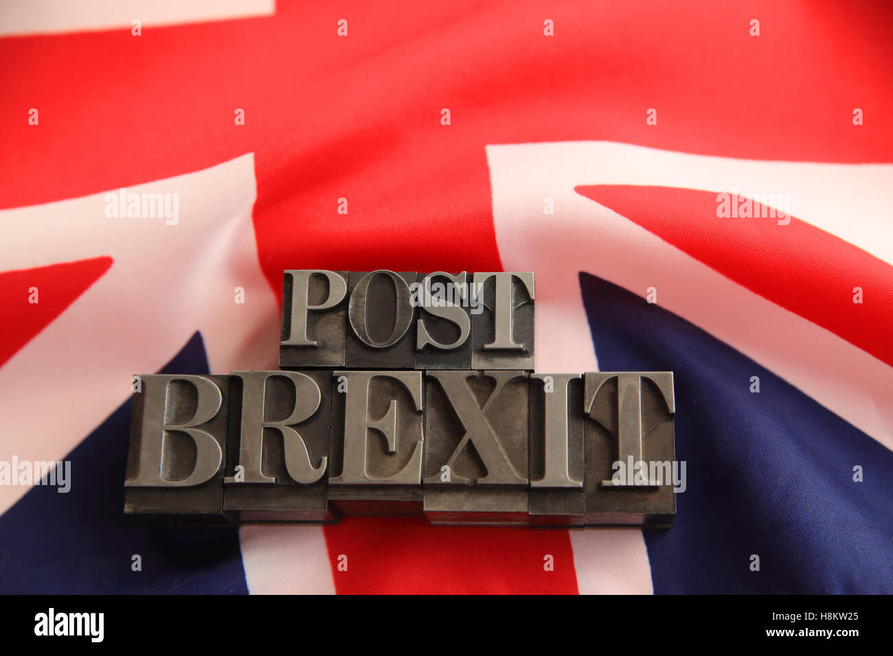 UK flag with post Brexit words in metal type with room for text Stock Photo