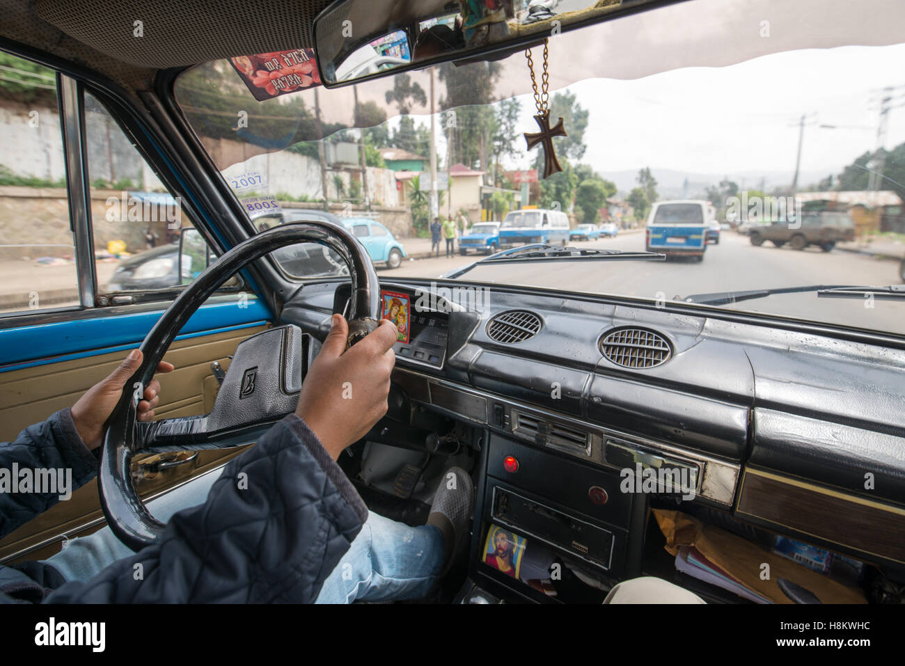 Addis Ababa, Ethiopia- Mn driving a Land rover Series 3 pick up truck through the streets of Addis Ababa. Stock Photo