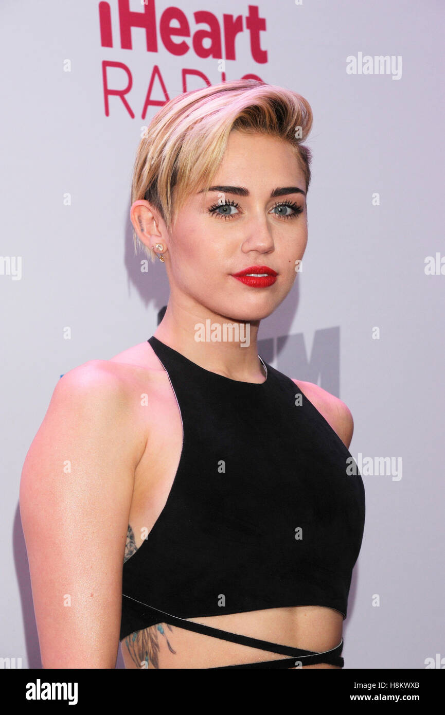 Singer Miley Cyrus arrives to the 2013 KIIS FM Jingle Ball on December 6, 2013 at Staples Center in Los Angeles, California. Stock Photo